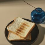 Toastul breakfast with colorful toppings on artisan bread